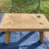 Small bench, footrest in artisanal raw wood