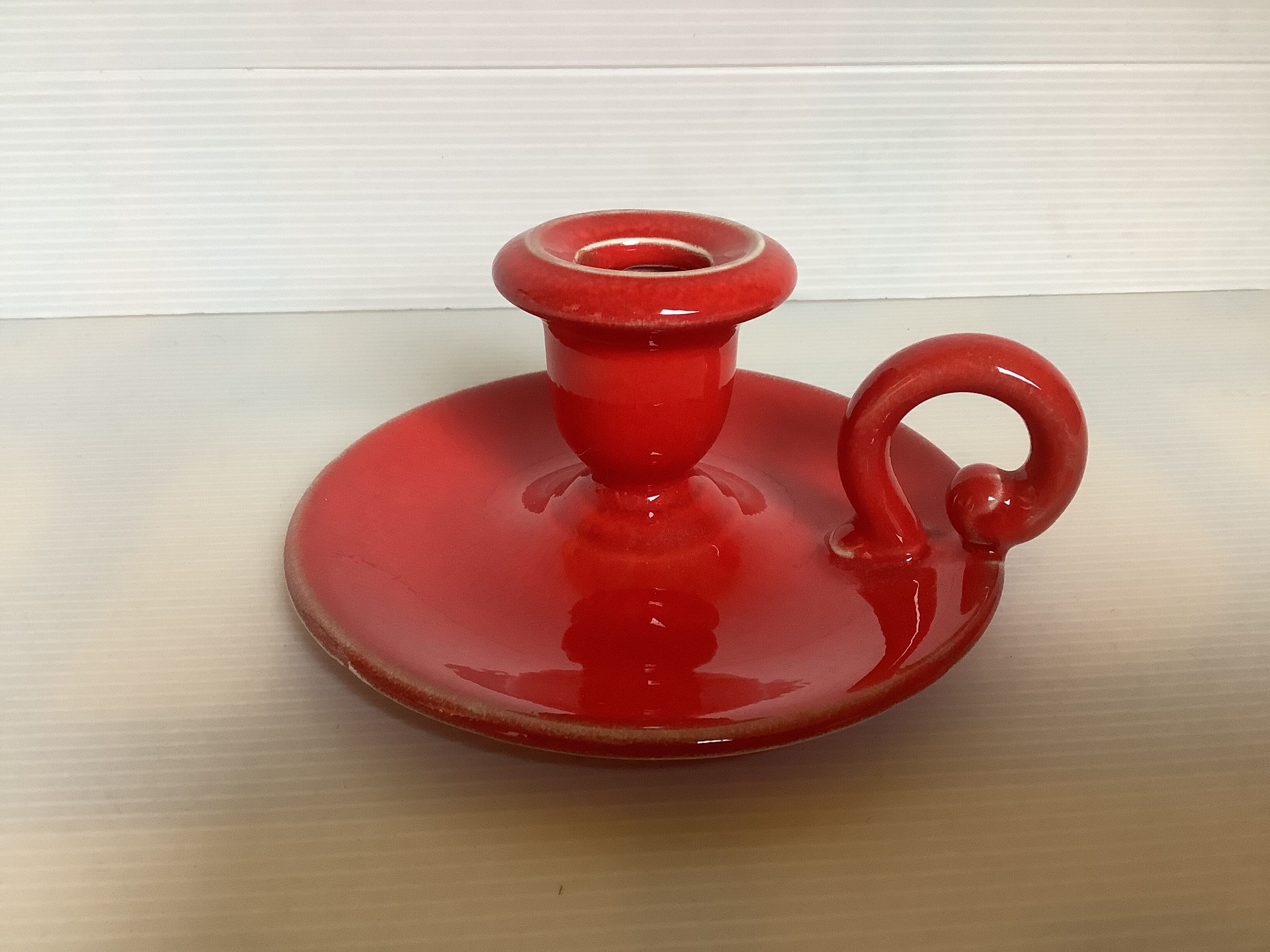 Red ceramic cellar rat candle holder