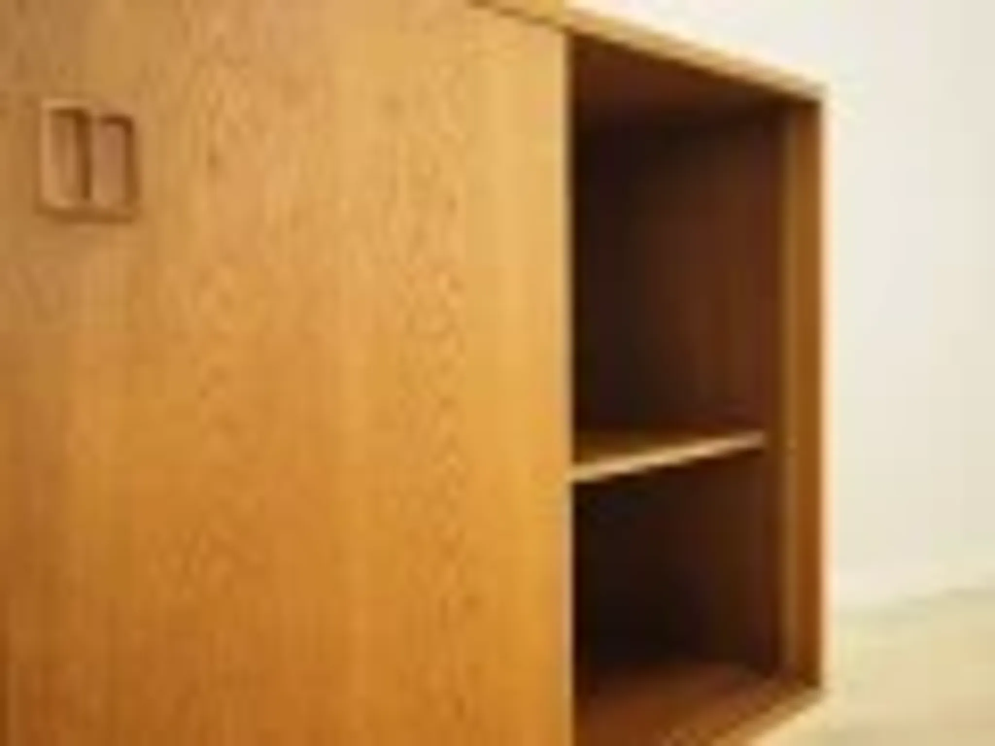 Ash cabinet with sliding doors by Hjørnebo, Danish, 1960s
