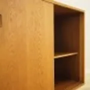 Ash cabinet with sliding doors by Hjørnebo, Danish, 1960s