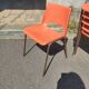 6 orange chairs