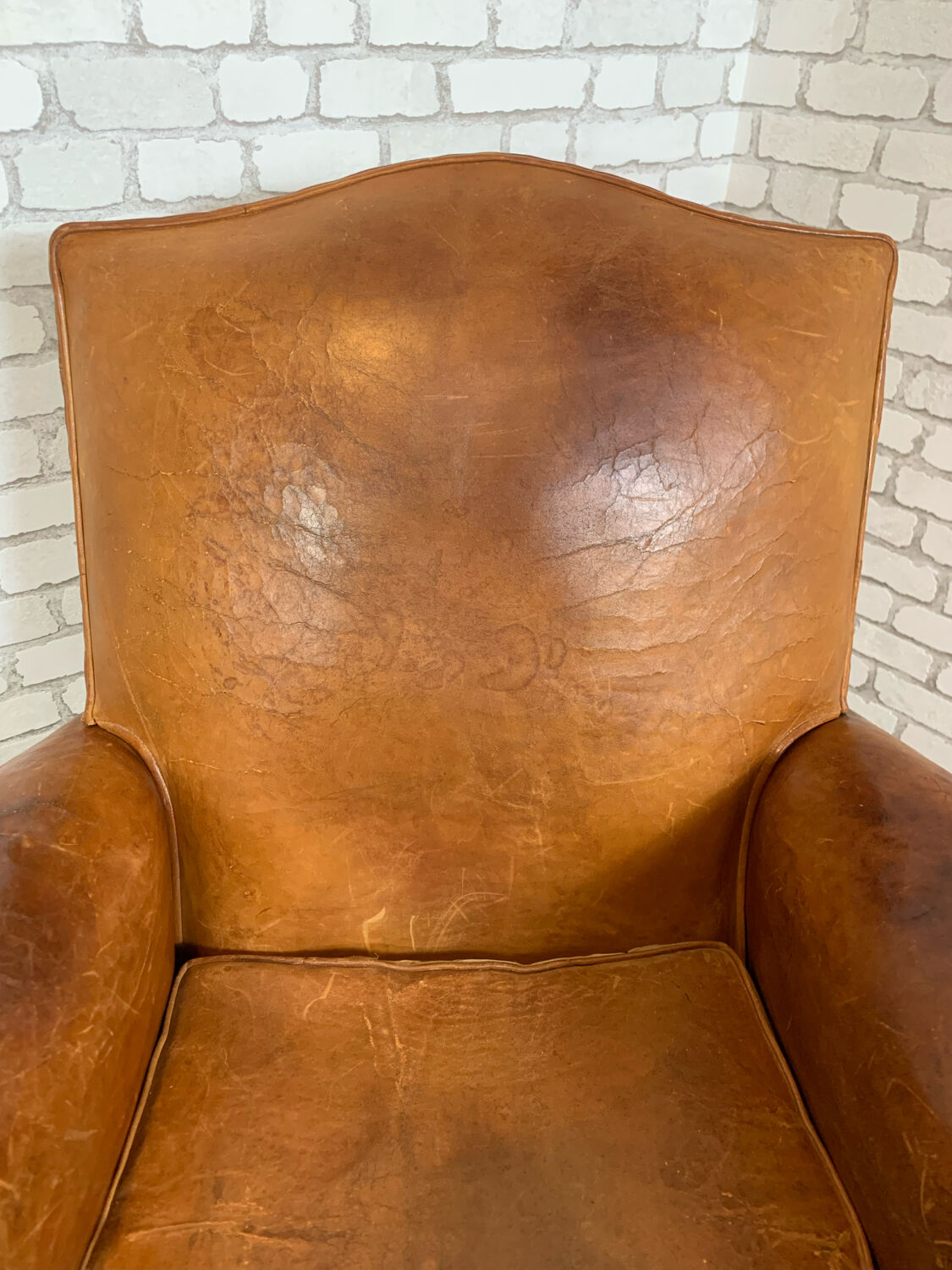 Club armchair in leather 1930