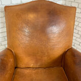Club armchair in leather 1930