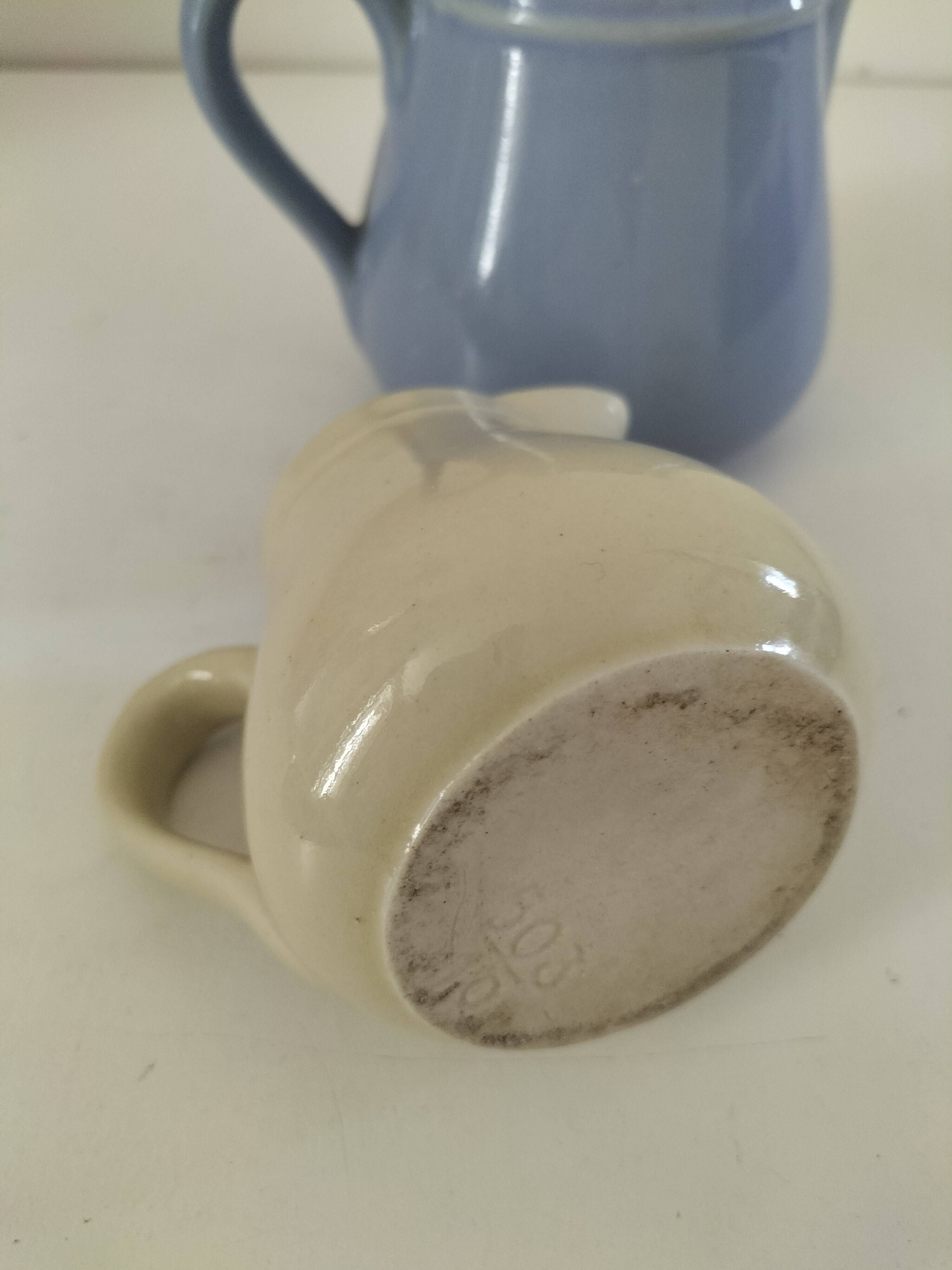 Duo of pastel ceramic milk jugs – Lavender blue & vintage cream