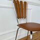 Flower petal chair in brown Skaï