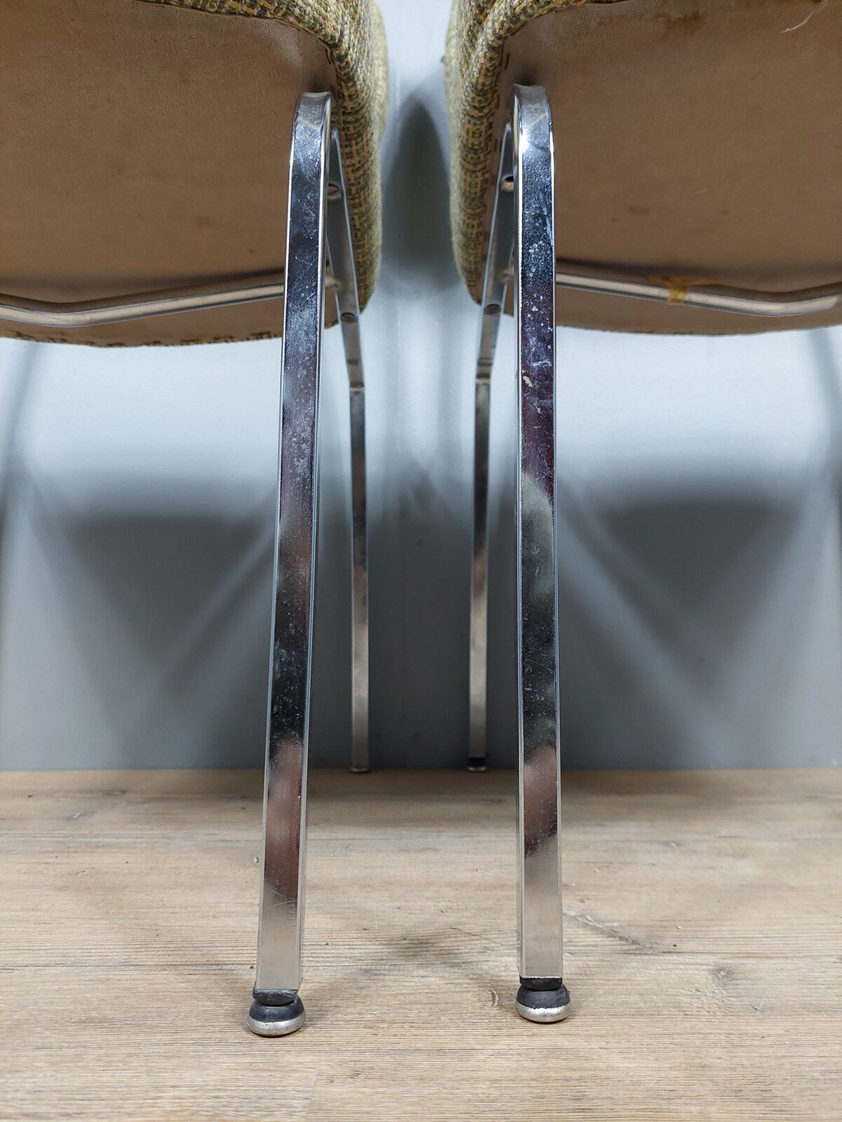Pair of vintage chairs in fabrics and metal