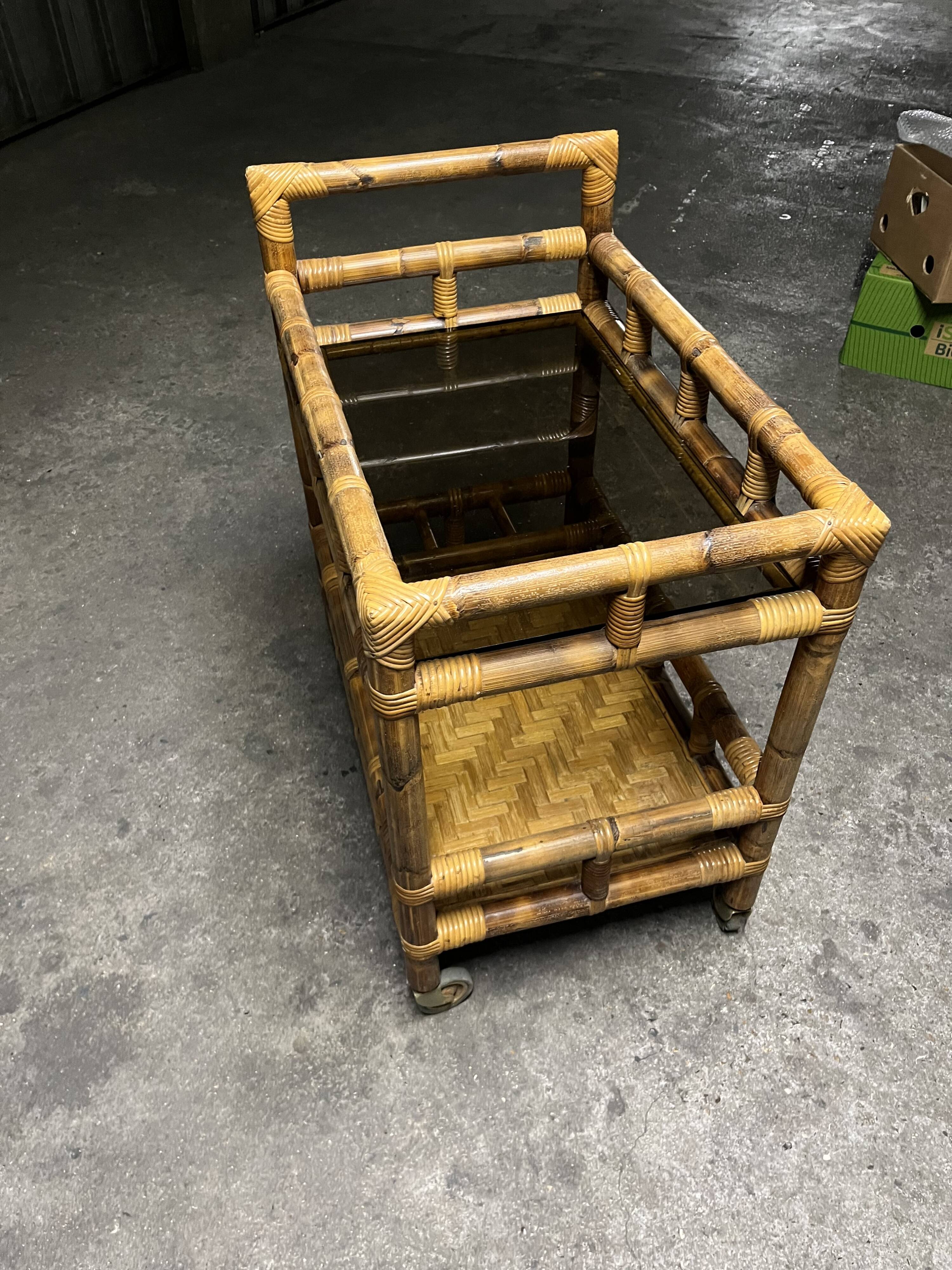 Vintage 1950s bamboo trolley or serving cart.