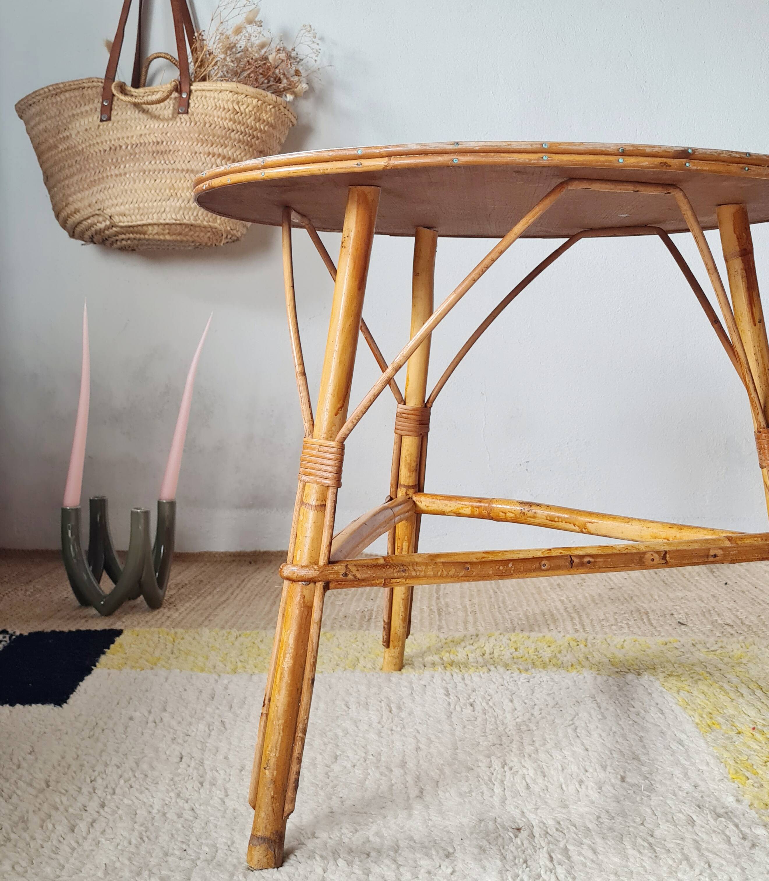 Round soft pink rattan table