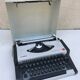 Olympia traveller luxury typewriter with its trunk