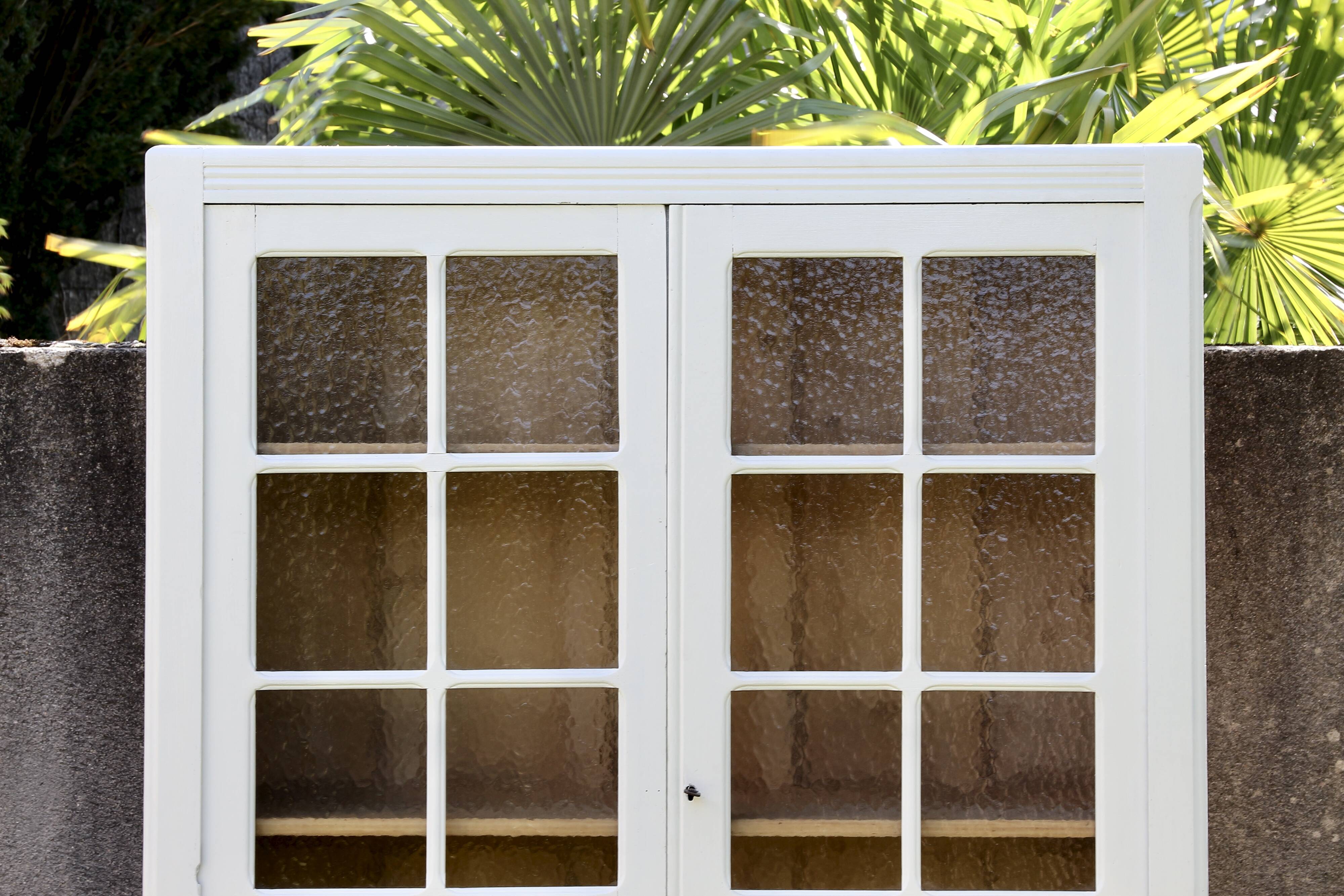 Vintage glass-fronted Parisian wardrobe