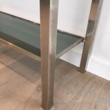 Beautiful console table in brushed metal with bluish glass shelves