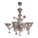 Chandelier in transparent and pink Murano-style glass with flower and leaf.