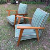 Pair of emerald green fabric armchairs circa 1950