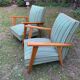 Pair of emerald green fabric armchairs circa 1950