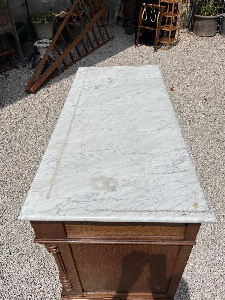 Commode with a white marble top