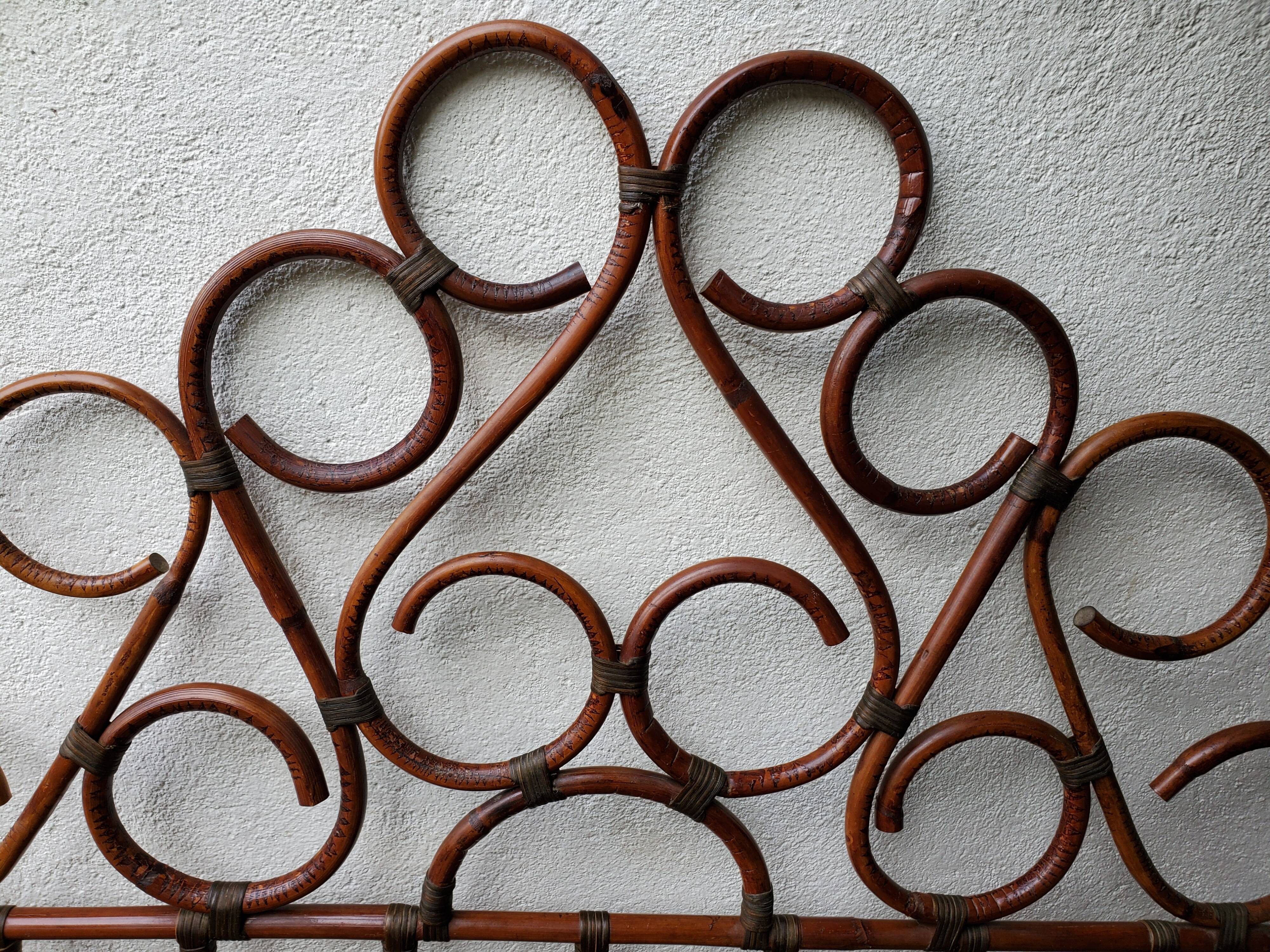 Rattan and brass headboard