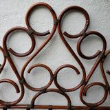 Rattan and brass headboard