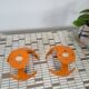 Set 2 x space age oranje haken, wandhaak, kapstok