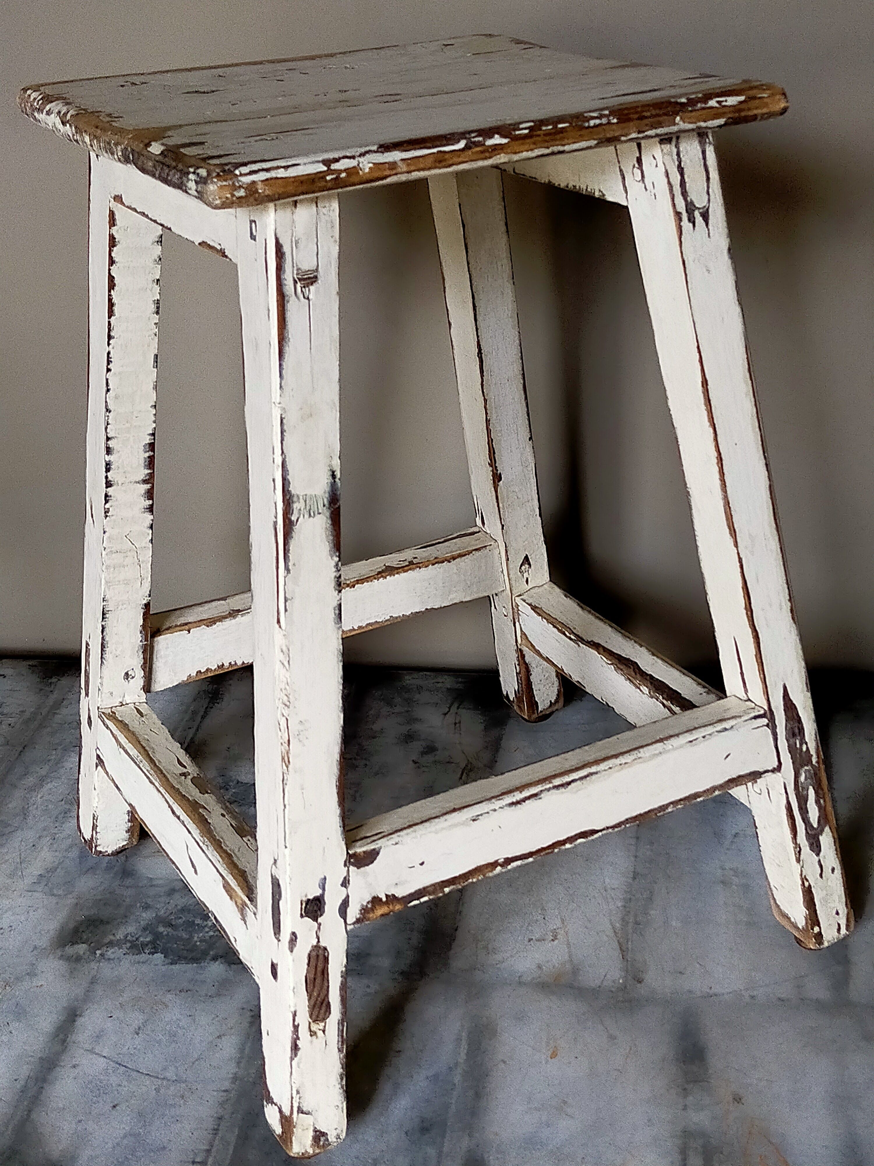Old patinated workshop stool