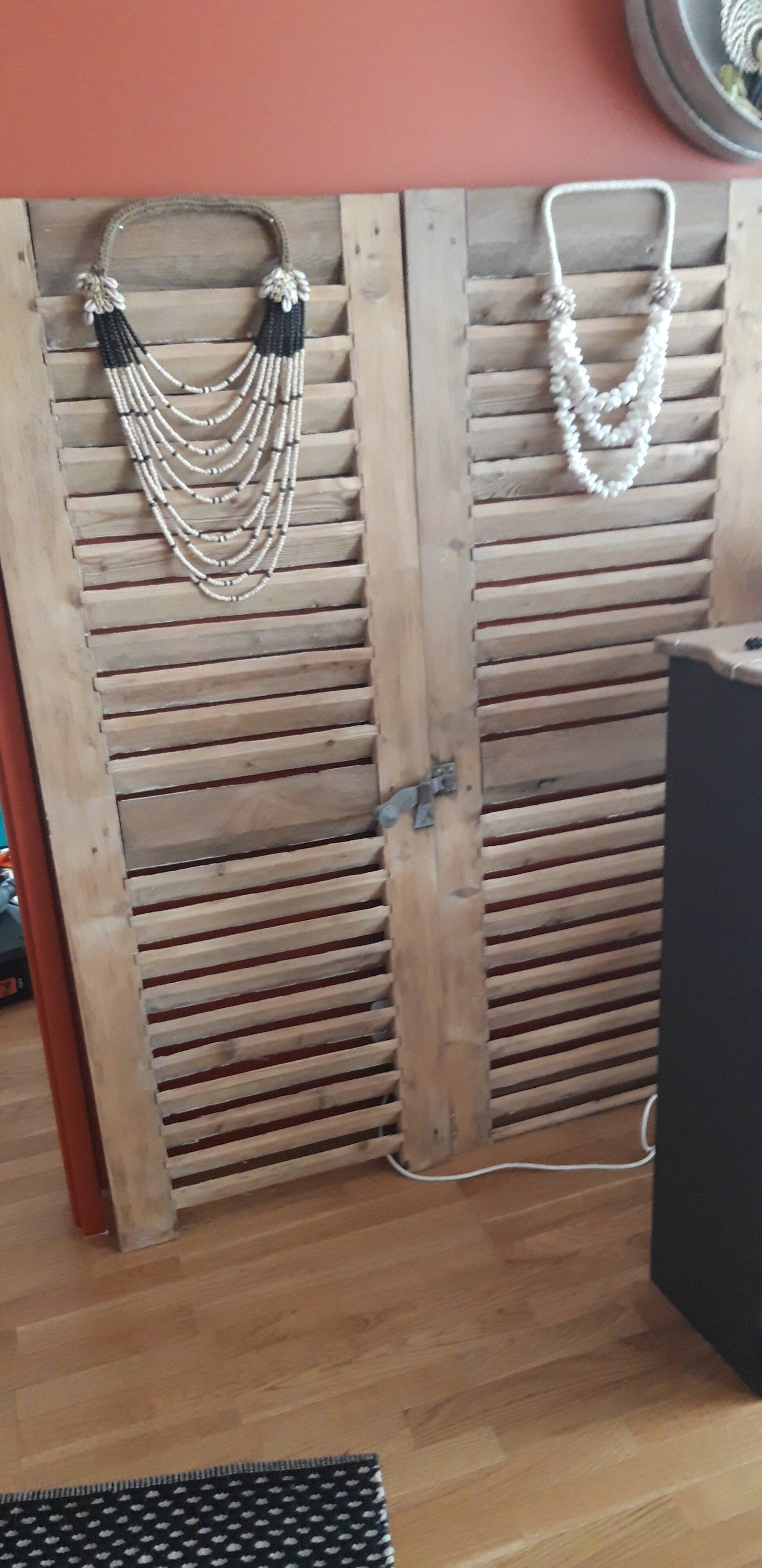 Pair of old unwrapped shutters