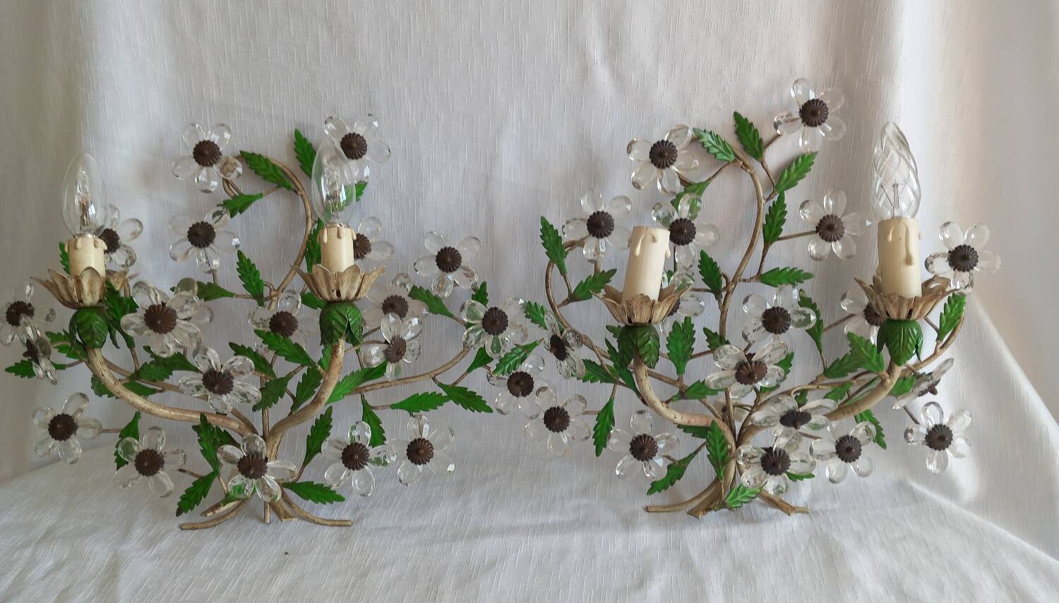 Pair of Italian Florentine wall sconces in tin and glass.