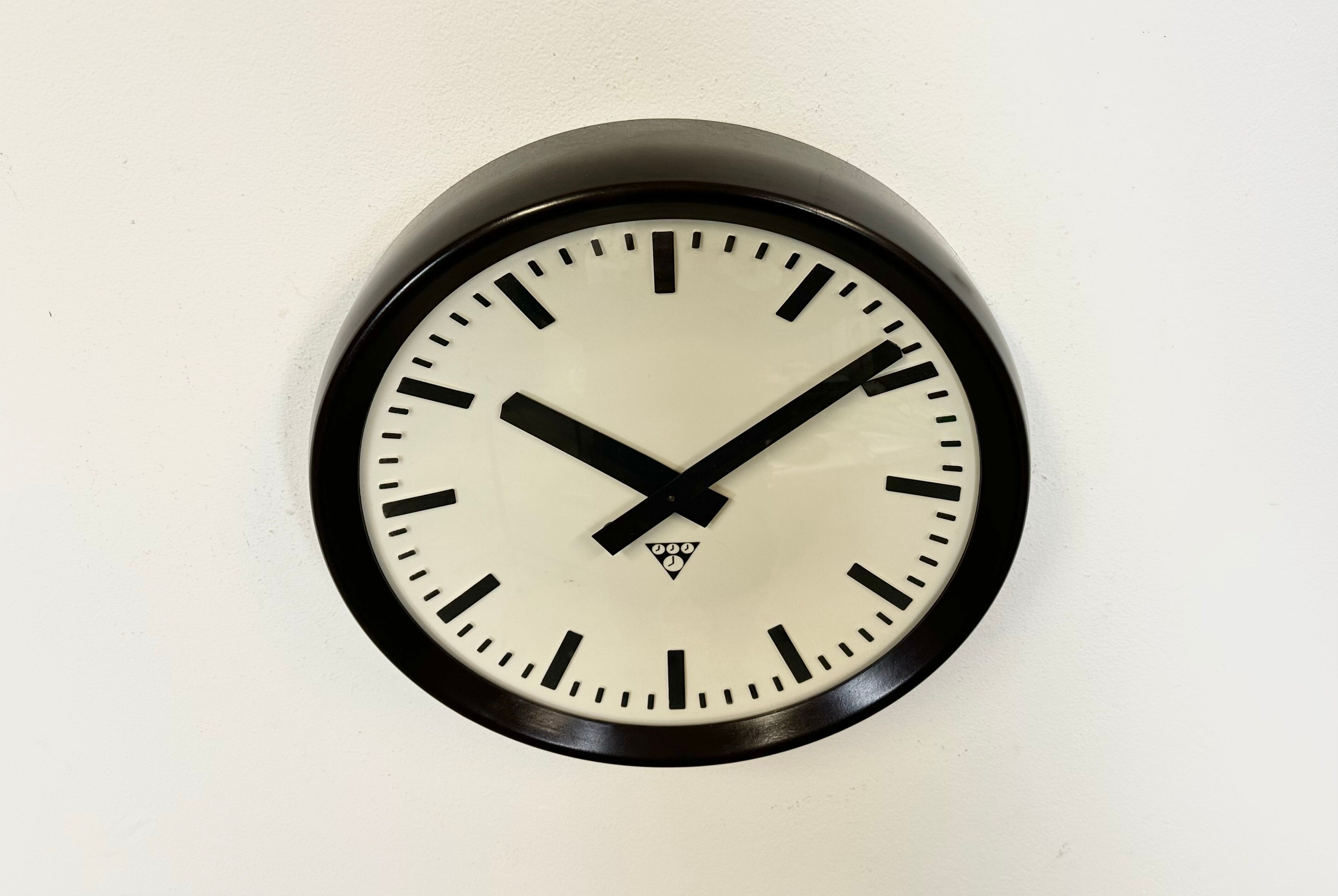 Industrial bakelite factory wall clock from Pragotron, 1960s