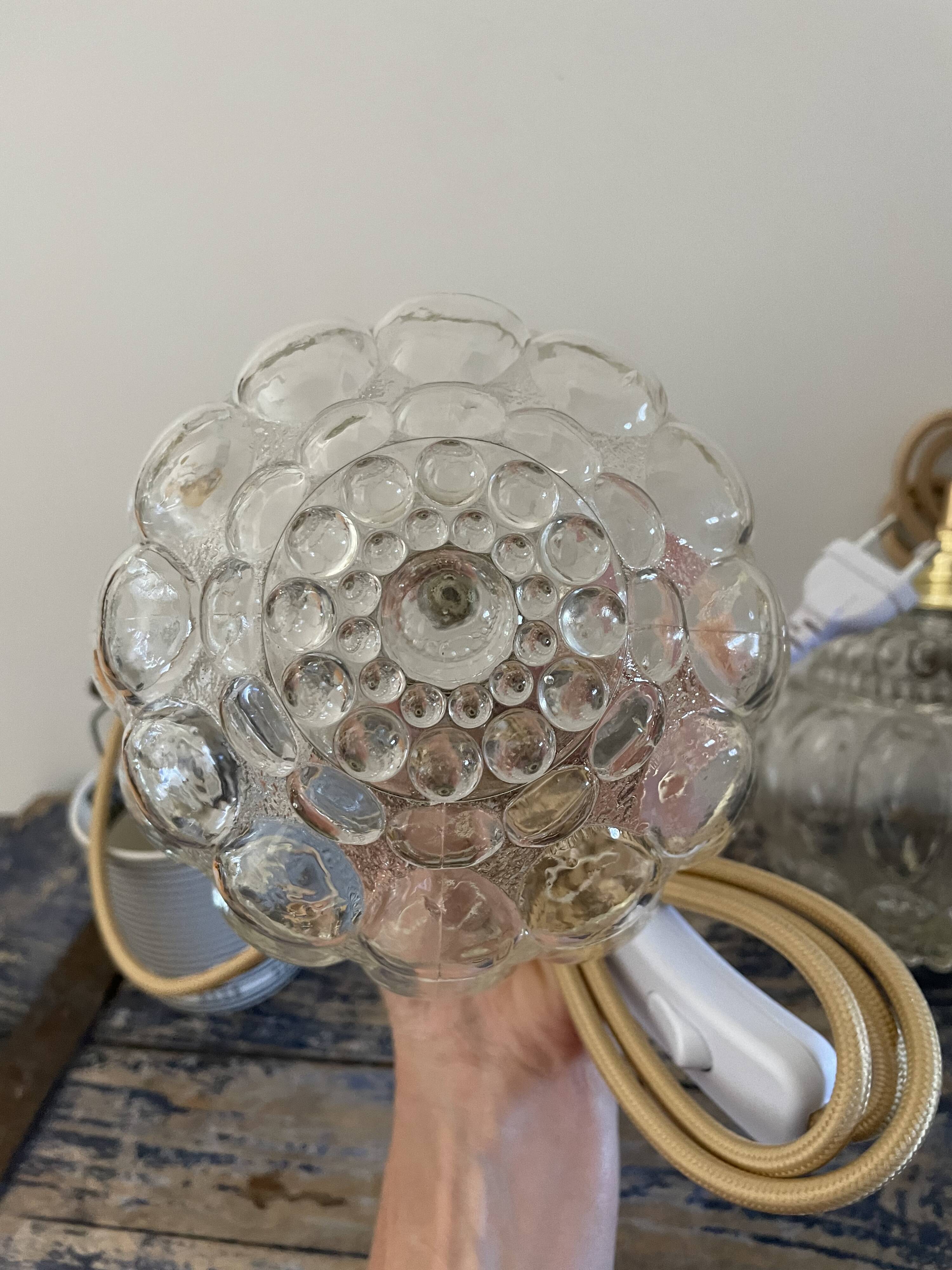 Set of two vintage globe players in chiseled glass