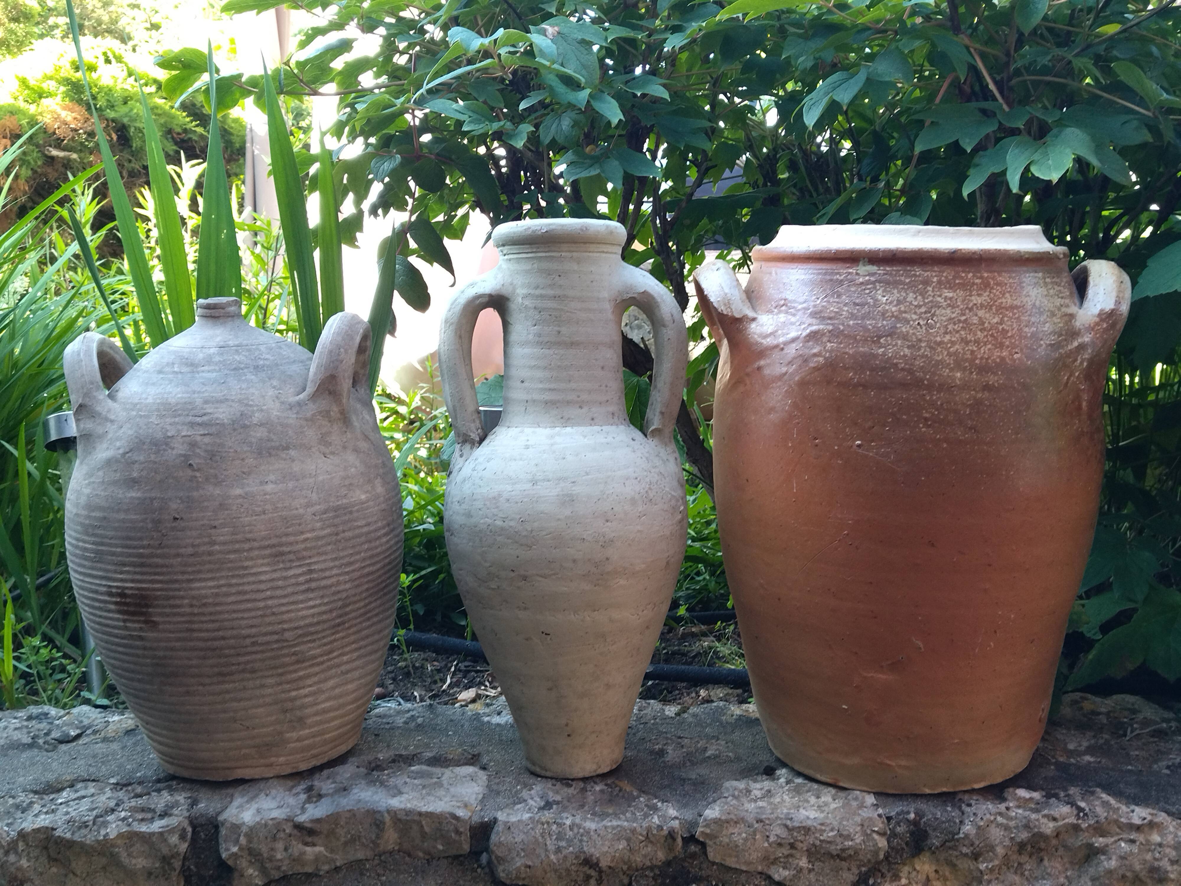 Ancient sandstone jar with two handles
