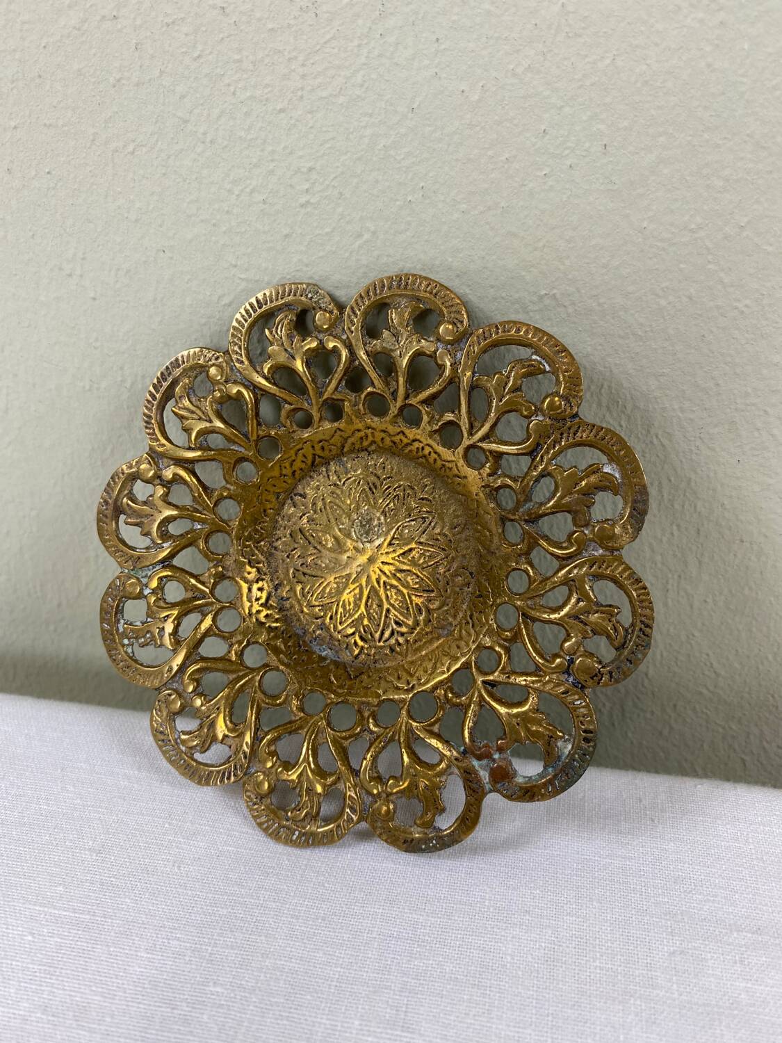 Brass pocket emptier