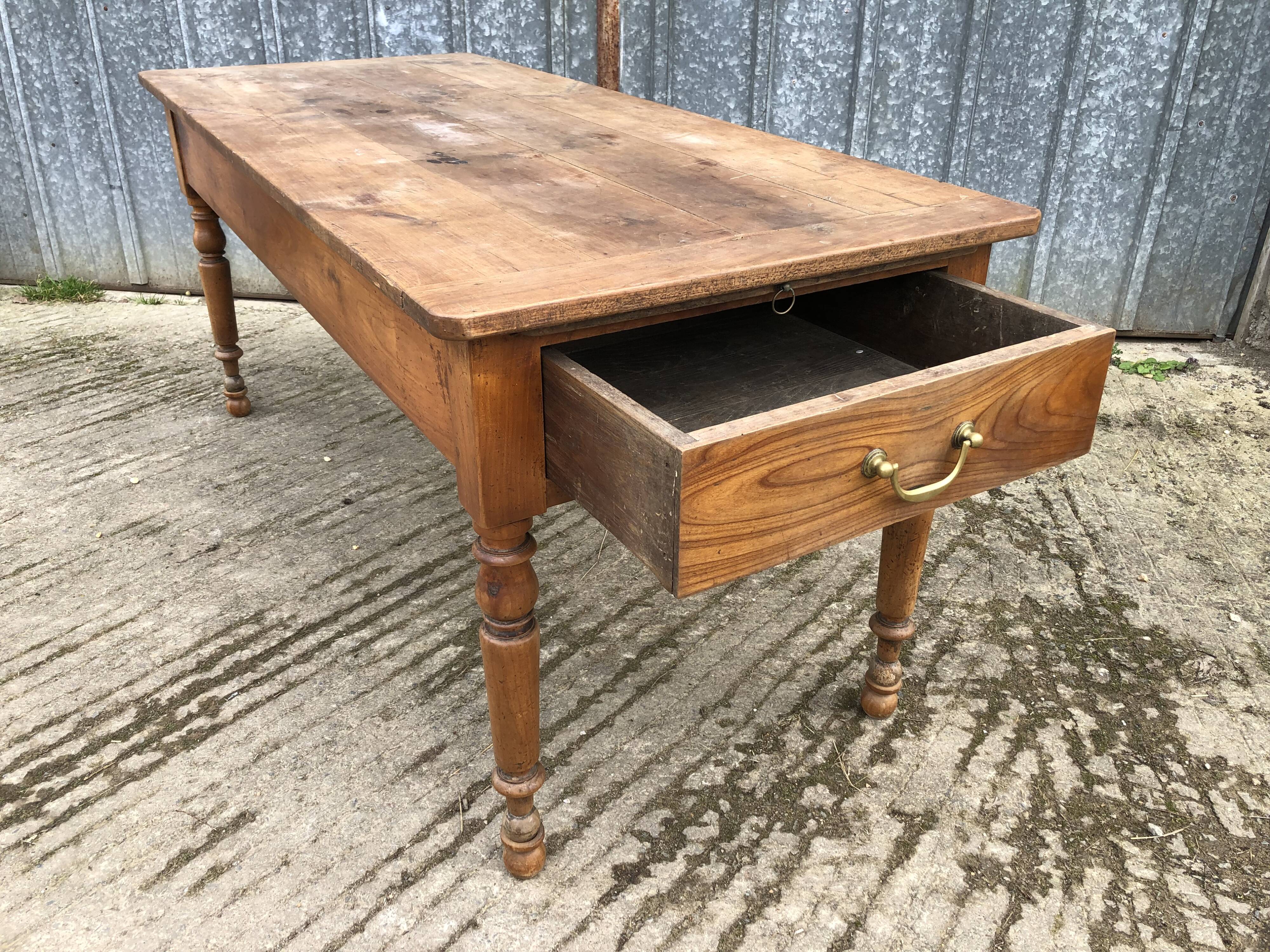 Antique cherry farmhouse table with 2 drawers and 1 pull-out