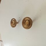 Pair of antique Empire furniture knobs in gilded solid bronze.