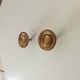 Pair of antique Empire furniture knobs in gilded solid bronze.