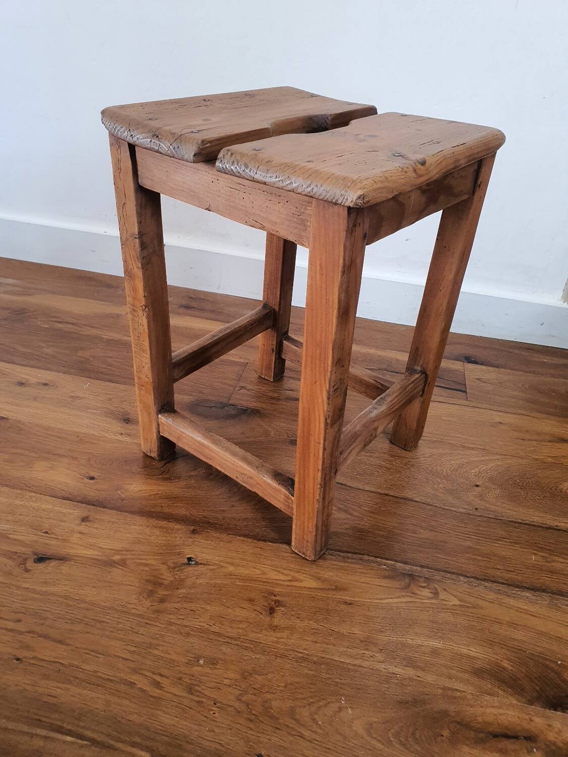 Antique wooden farm stool