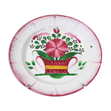 Plate and its wall attachment
