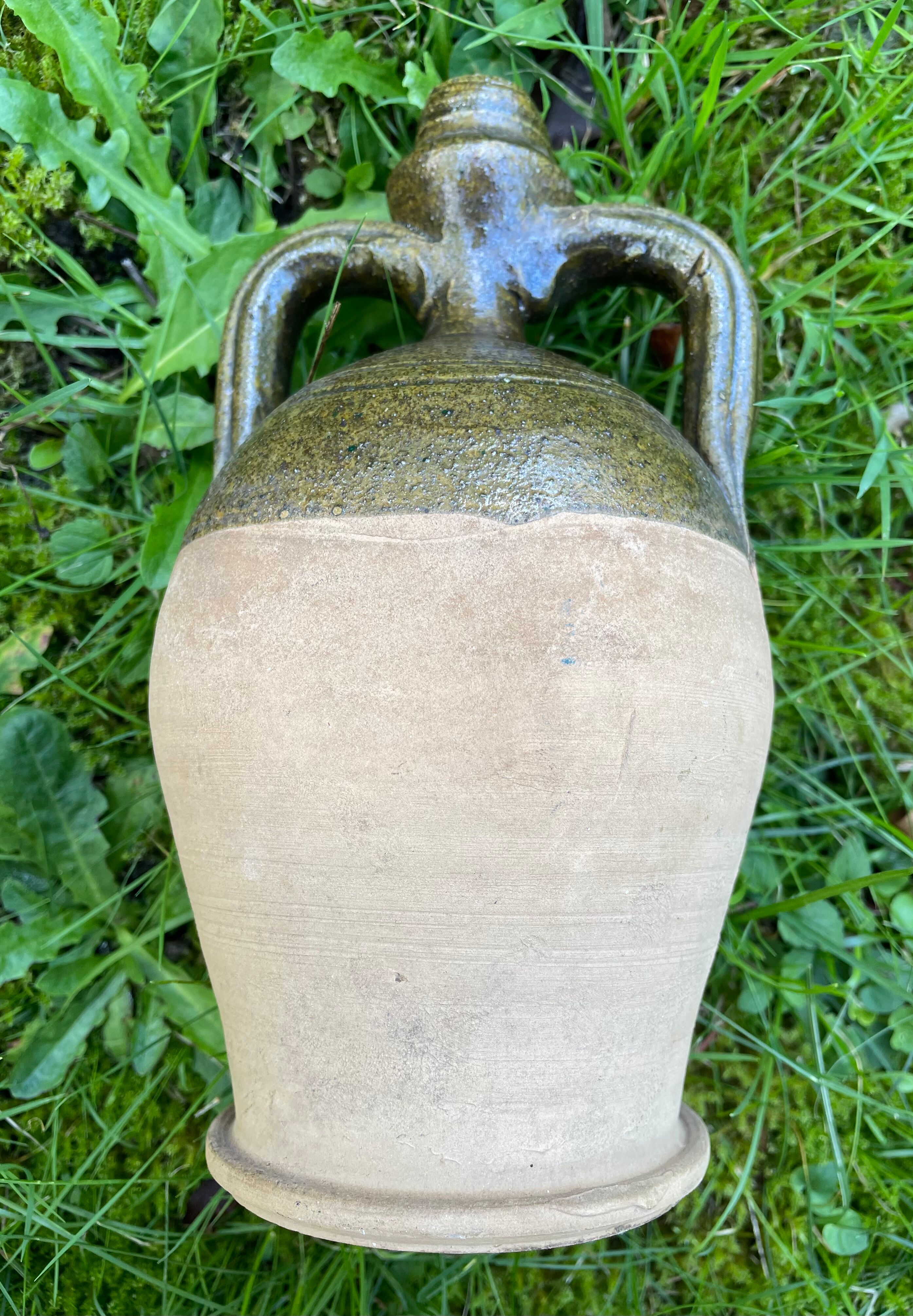 Persimmon glazed terracotta oil jar