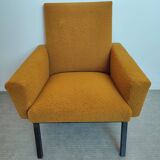 Fauteuil design en bouclette jaune cumin