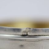 Small round box with silver pills