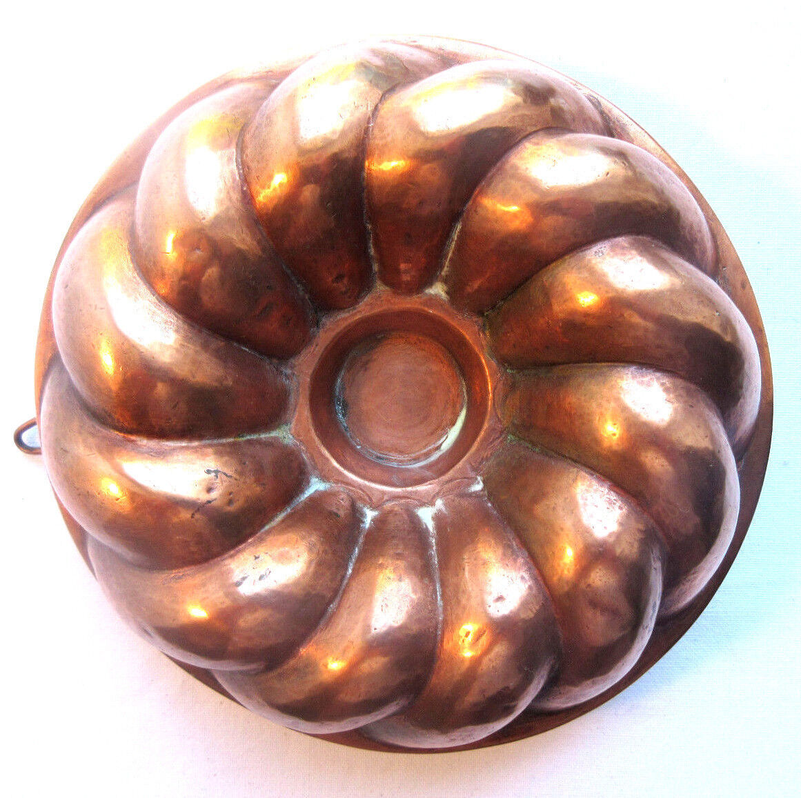 Old copper cake pan, braided crown, kitchen utensil