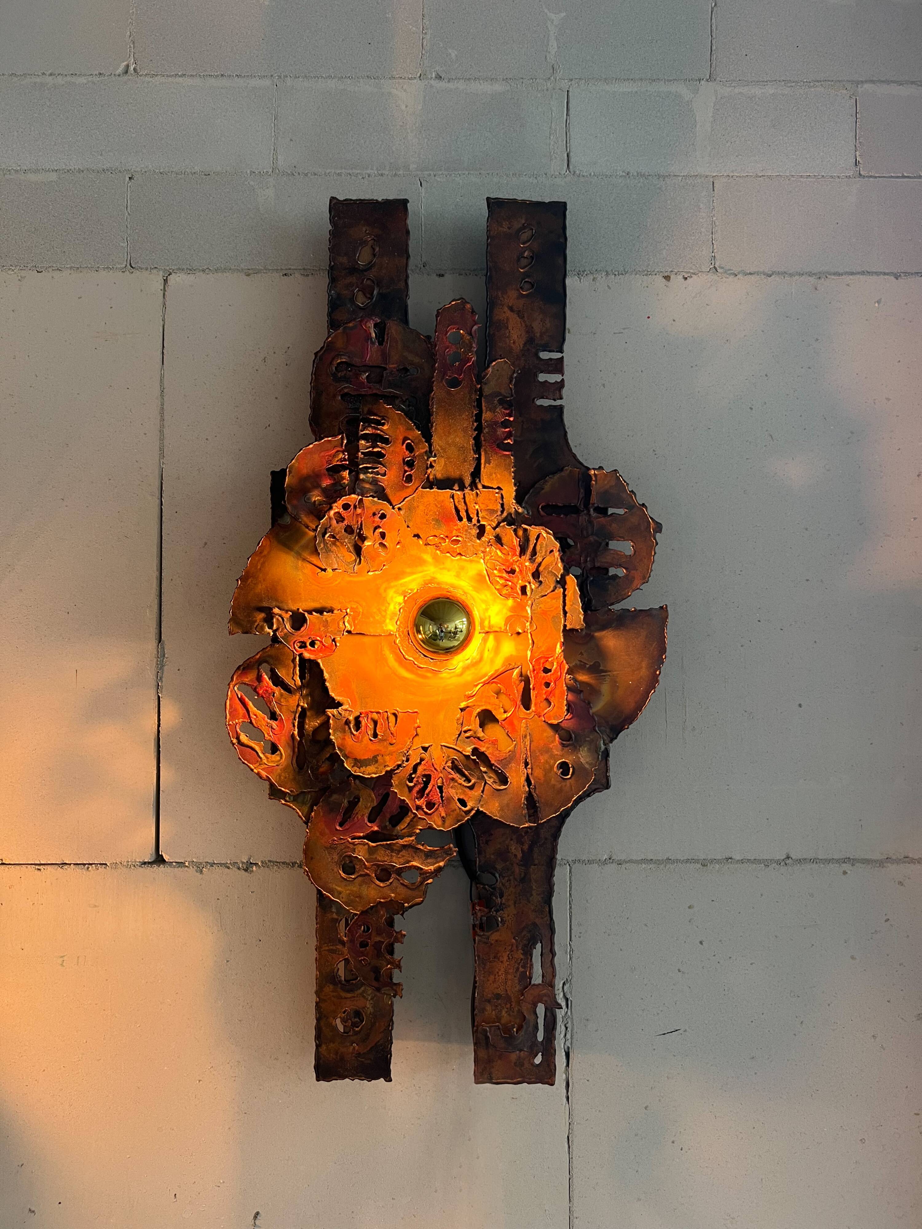 Raw expressive wall sconces by Francesco Pasinato