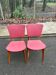 2 Scandinavian chairs in solid wood and burgundy leather from the 1970s.