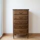 Antique chest of drawers with 5 wooden drawers.