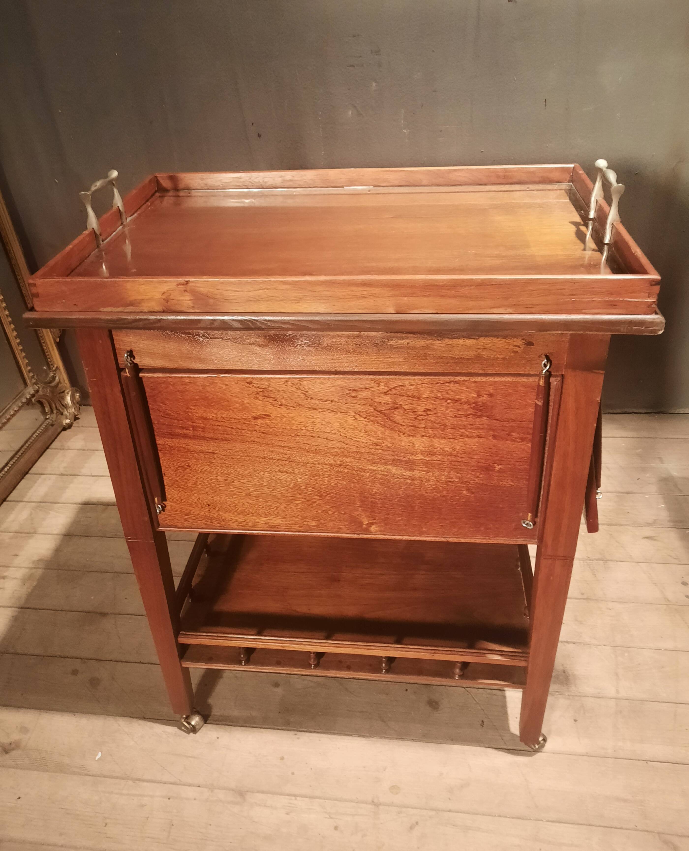 Sideboard with four drop-leaves