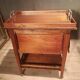Sideboard with four drop-leaves