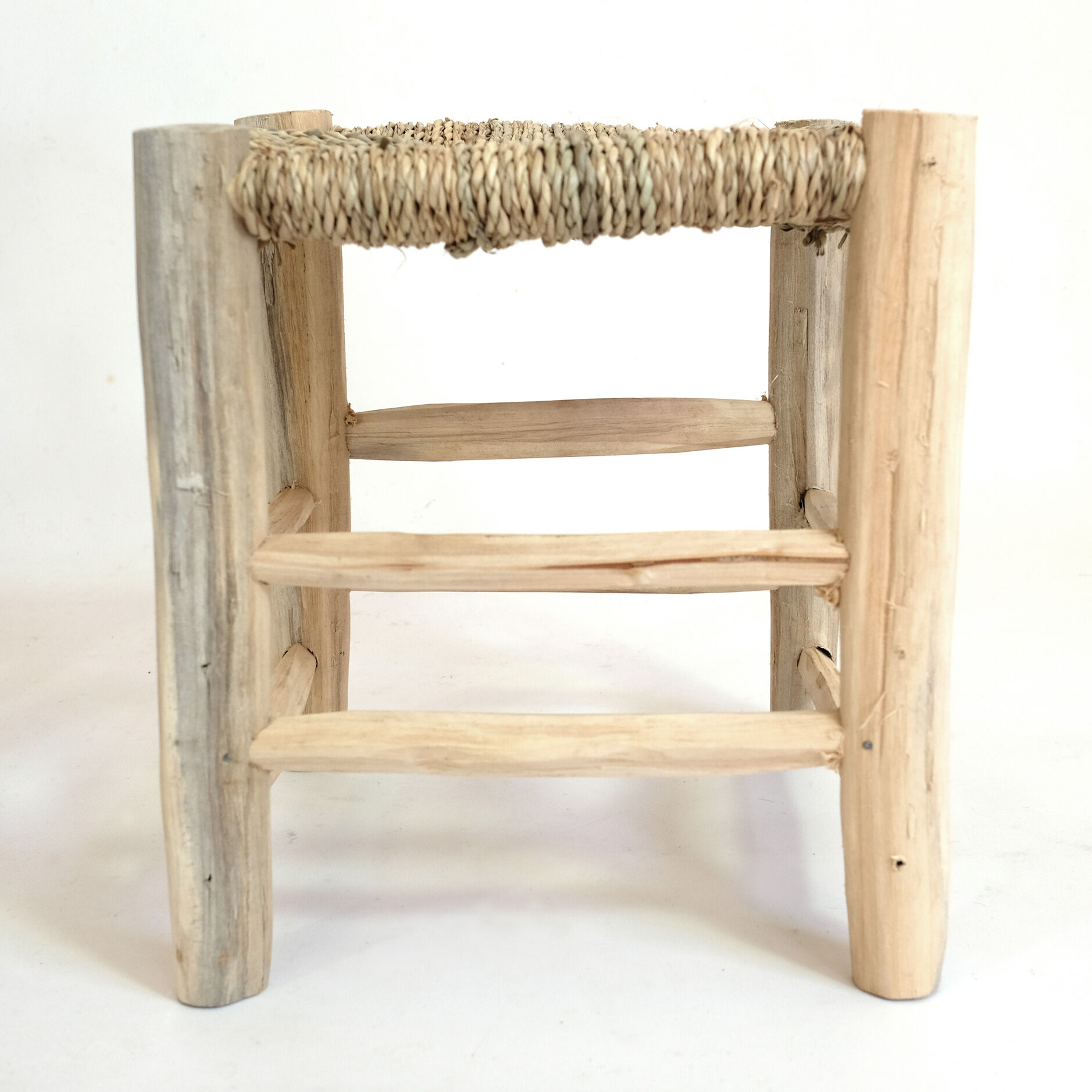 Minimalist stool made of wood and rope