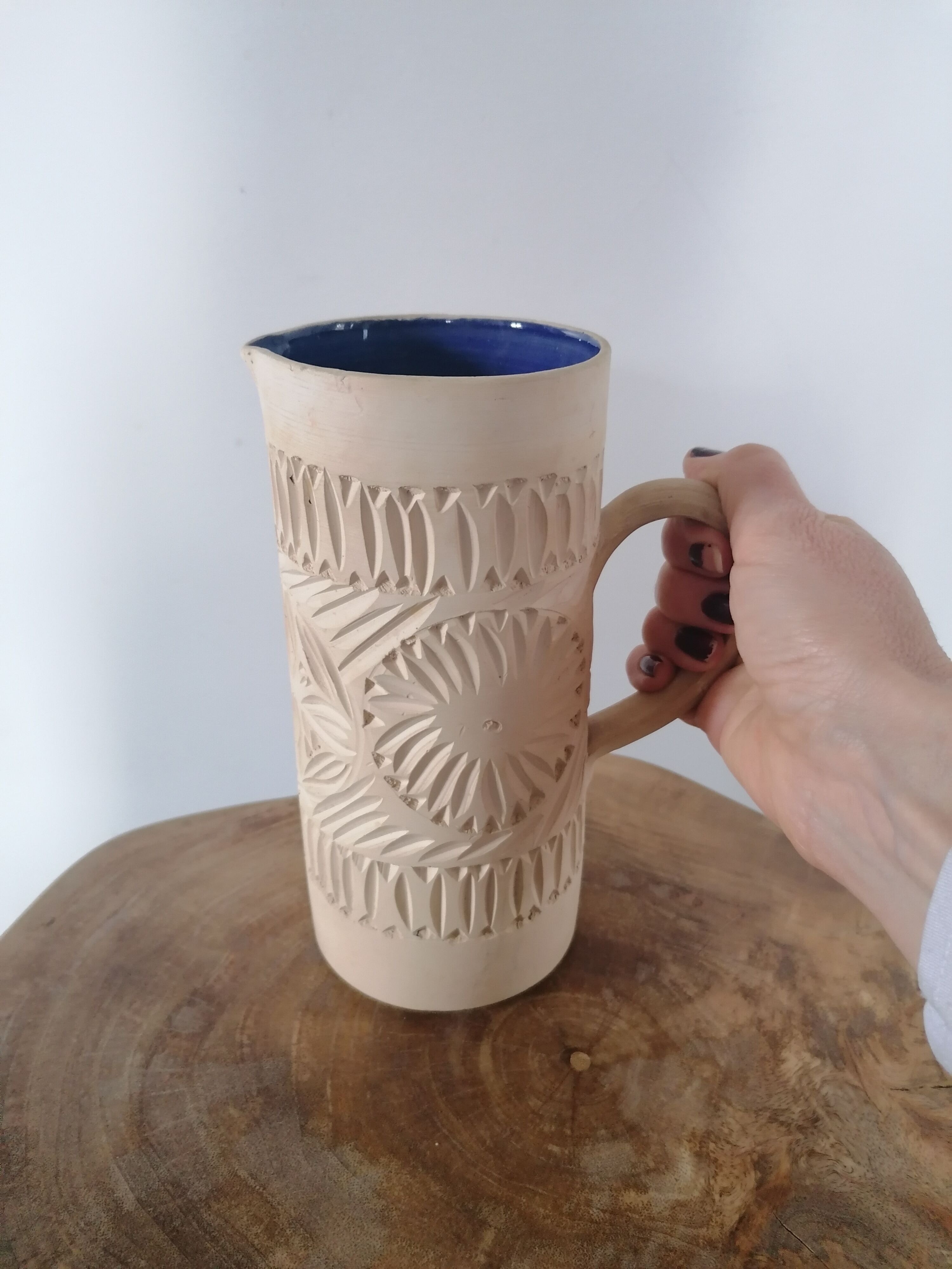 Natural terracotta carafe enamelled inside