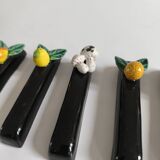 Set of 8 barbotine knife holders
