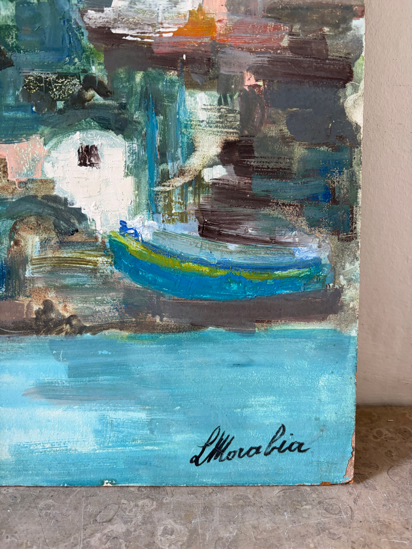 Village by the water, oil on panel signed Morabia.