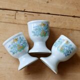Vintage white porcelain egg cups with floral pattern
