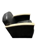 Pair of leather armchairs with marquetry armrests