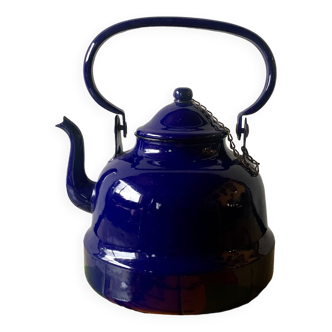 Vintage kettle in blue enameled sheet metal